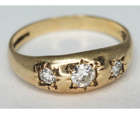 A hallmarked 9ct gold ring set with colourless stones, gross wt. 2g, size P.  