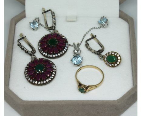 A mixed lot of jewellery comprising a hallmarked 9ct gold ring set with an emerald gross wt. 2g size P, a pair of multi-gem d