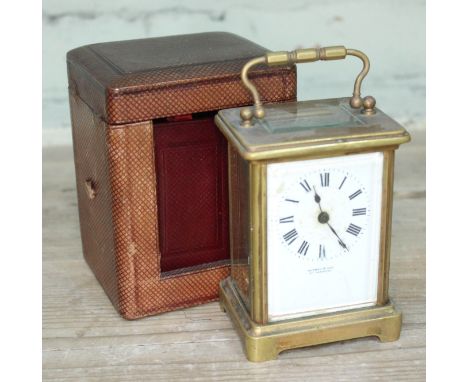A late 19th century brass carriage clock, the dial inscribed 'Aldred &amp; Son', with leather case.  