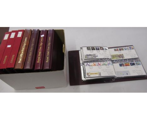 Box of eight albums containing a collection of First Day covers 