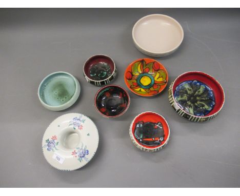 Group of eight various Poole pottery shallow bowls 