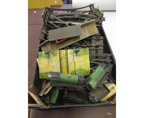 Box containing a quantity of O-guage clockwork trains with rolling stock track etc. 