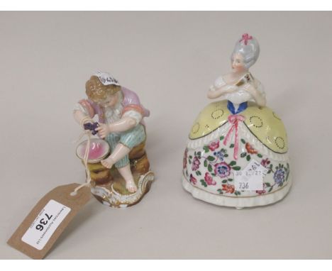 Meissen figure of a seated boy, holding grapes, (two small chips to base) 4.25ins high, together with a Goebel perfume flask 