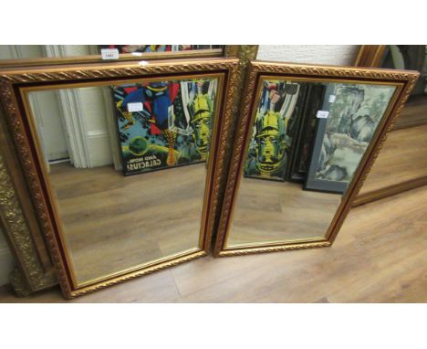 Pair of modern gilt framed, rectangular wall mirrors with bevelled plates, 23ins x 34ins eachMirrors hang portrait 
