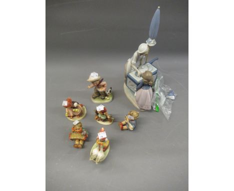 Group of five various Goebel Hummel figurines and another large similar, together with a Lladro group ' The Ice-cream Seller 