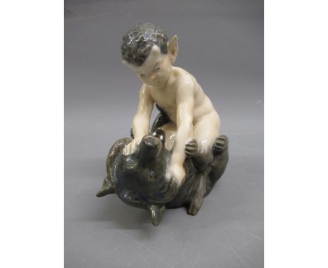 Royal Copenhagen figure of a faun wrestling a bear cub, 6.25ins highIn good condition, no damages 