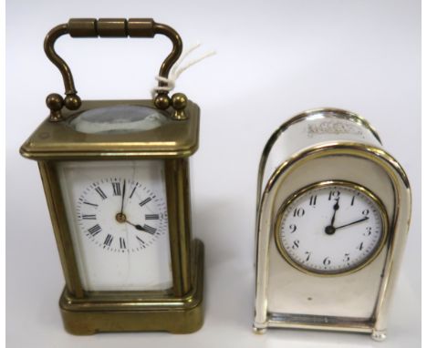 Miniature brass cased carriage clock with enamel dial and Roman numerals, (at fault), together with another in an silver plat