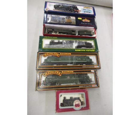 Bachmann 00 gauge locomotive and tender, BR Class 4 Standard, together with a similar diesel locomotive, a Hornby 4-6-2 locom