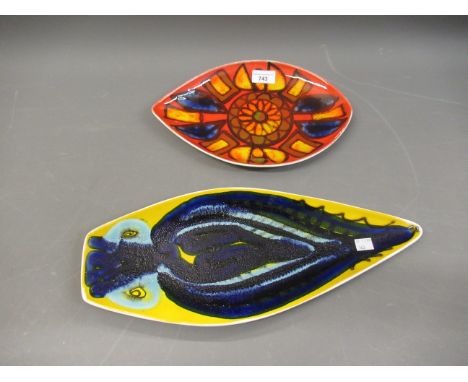 Two Poole pottery dishes in Delphis and fish patterns, 12ins and 17.5ins wide 