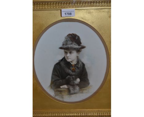 19th Century over painted photographic print of opaque porcelain half length portrait of a young lady in fur collared coat in