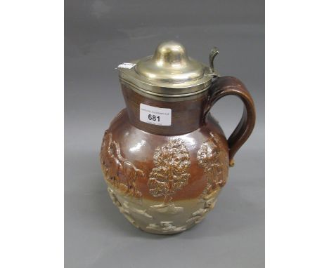 19th Century salt glazed hunting jug with relief moulded decoration and a silver cover with hinged lid, 8ins highSome chips t