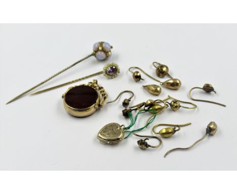 Two stick pins, one 9ct gold set amethyst, the other moonstone set, 9ct gold revolving fob seal (at fault), small 9ct gold lo