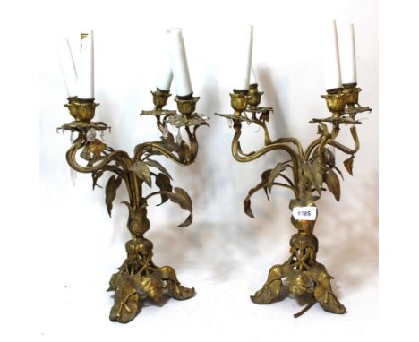 Pair of 19th Century ormolu four light candelabra of stylised floral design adapted for us with electricity, 14ins high 