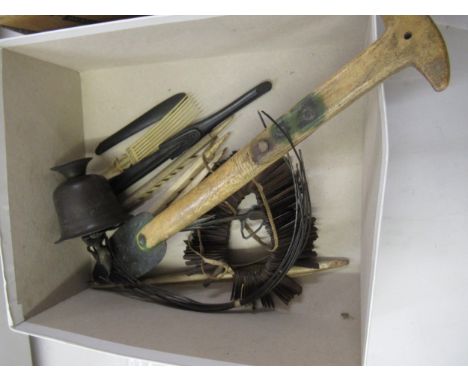 Small quantity of native bone carved fishing spears, necklace, bone comb, small staff (at fault), and a metal Indian cup 