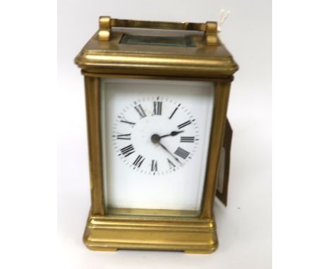 Good quality 20th Century gilt brass cased carriage clock, the enamel dial with Roman numerals engraved 'Color Sargeant Catte