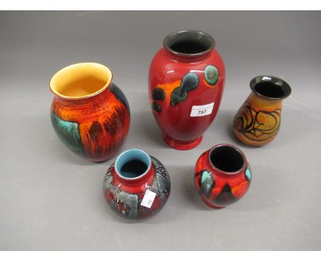 Poole pottery Volcano pattern baluster form vase, together with four other smaller Poole pottery vases 