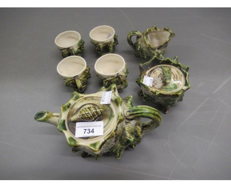 Seven piece shell form pottery part tea service 