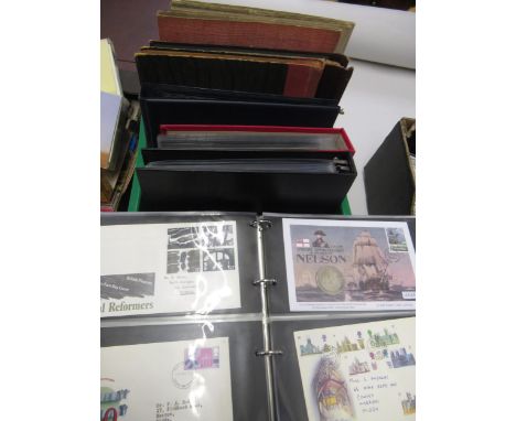 Box containing a collection of stamp albums, First Day covers, coin covers, presentation packs etc 