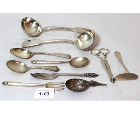 Two silver Fiddle pattern sauce ladles, small London silver spoon and fork, silver spoon and pusher, silver butter knife, tea