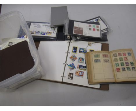 Box containing a collection of various World stamps and albums, including First Day covers 