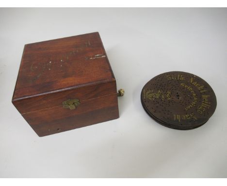 Small mahogany cased polyphon with various discs, discs 6.5ins diameterIt is not currently working. Please see further images