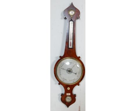 A 19th century Victorian mahogany wall mounted banjo barometer having a pointed top over a thermometer with a circular barome