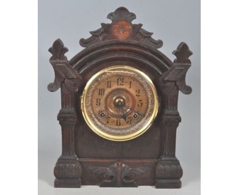 A late 19th century Victorian American mahogany mantle clock by the Ansonia Clock company. The clock having having a brass di