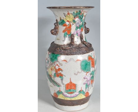 An 19th century / 20th century Chinese oriental ceramic crackle glaze vase. The baluster vase having a waisted neck decorated