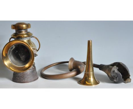An early 20th century Lucas King Of The Road brass illuminated car light No 722 having a makers plaque to the side and carry 