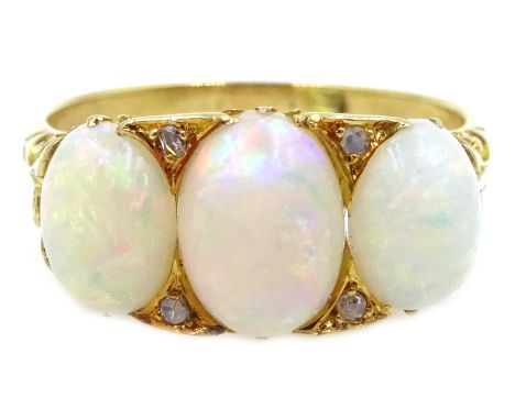 Gold three stone opal and diamond ring, stamped 18 Condition Report Approx 4.3gm, size O-PClick here for further images, cond