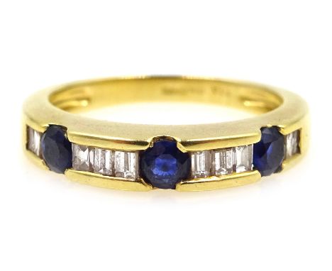 Three stone round sapphire and baguette diamond gold ring, hallmarked 18ct Condition Report Approx 3.9gm, size L-MClick here 