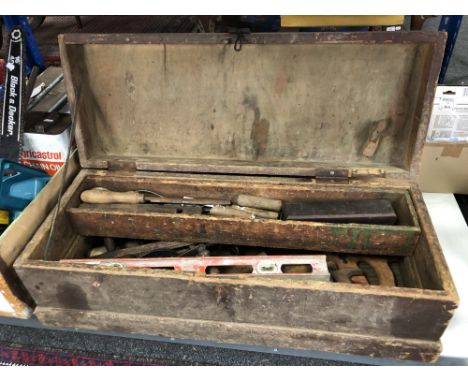 A vintage pine joiner's tool box containing hand tools, spirit level etc 