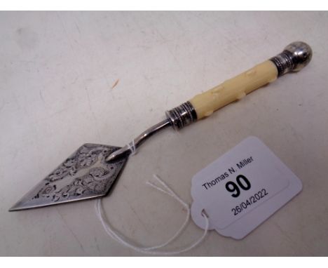 A Victorian silver plated butter knife in the form of a miniature trowel, length 16.5 cm.