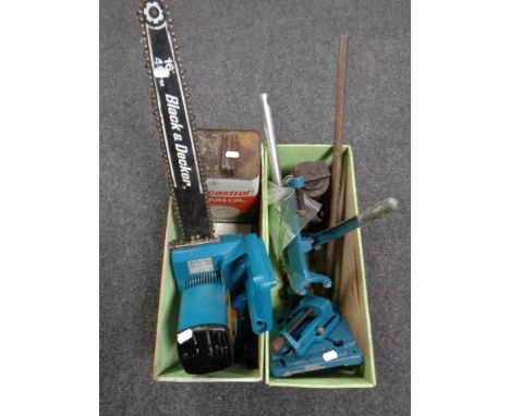 Two wooden crates containing Black and Decker chainsaw with chain oil, drill stand, bottle jack