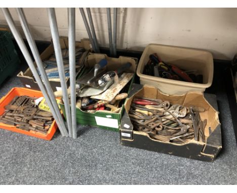 Five boxes and crates containing tap and die sets, scissors, Stanley knives, pliers, plastering tools, Paslode nails etc  