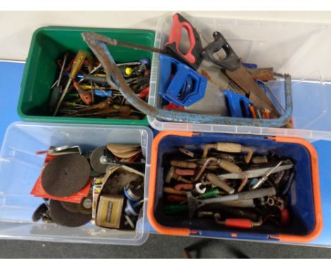 Four crates containing hand tools, saws, grinding discs, screw drivers etc 