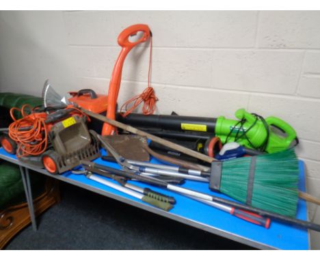 A large quantity of garden tools including Visimo electric lawn mower, Flymo multi trim, electric leaf blower, electric hedge