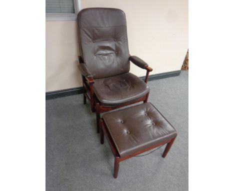 A Danish stained beech chair with brown leather upholstery with stool 