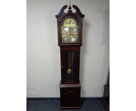 A Tempus Fugit longcase clock with pendulum and weights 