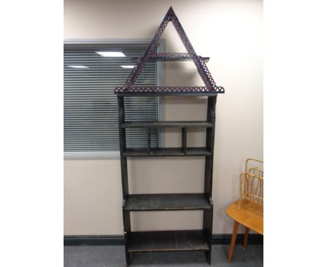 A set of early 20th century painted pine bookshelves together with a corner wall shelf 