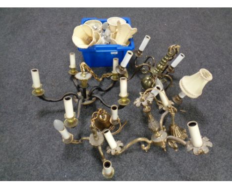 A box containing four continental brass and metal chandeliers together with a box containing light shades and bulbs