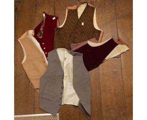 A case of twenty assorted, vintage men's waistcoats, from the 1940's through to the 1990's, various styles and fabrics