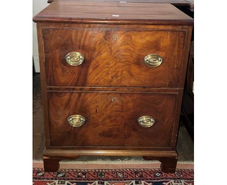 A 19th Century mahogany bedside commode, rectangular moulded top, raised on bracket feet.