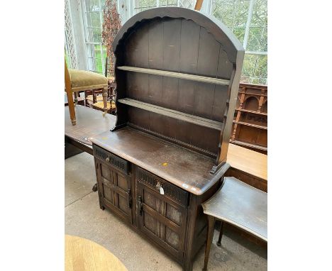 A 20th Century Ercol oak dresser and rack, 187cm high, 120cm wide, 46cm deep