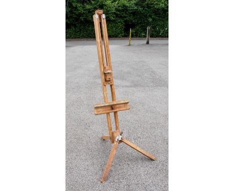 A 19th/20th Century beech artist easel, by Reeves of England, of tripod form with adjustable settings, 175cm high.