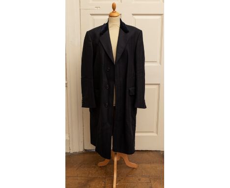 A gentleman's navy pure wool overcoat (city coat) with navy velvet collar, four buttons to each cuff, lined with Christian Di