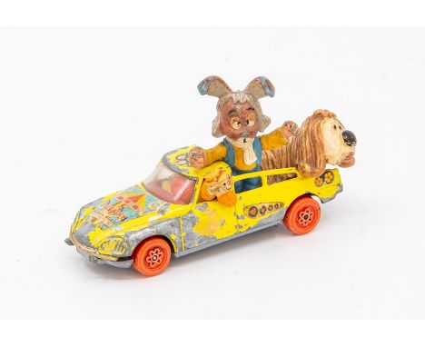 A Corgi No.807 'Magic Roundabout' TV tie-in die-cast model vehicle, the Citroen DS based pick-up with yellow livery, gummed p