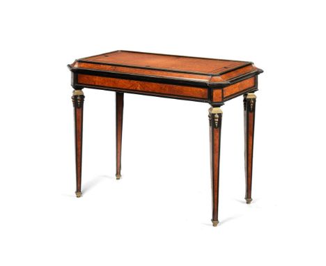 ϒ A French amboyna, ebonised and gilt-metal mounted jardinière table, in the Louis XVI style, circa 1870, the canted rectangu