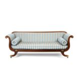 A Regency beechwood, parcel-gilt and brass-mounted scroll-end sofa, circa 1815