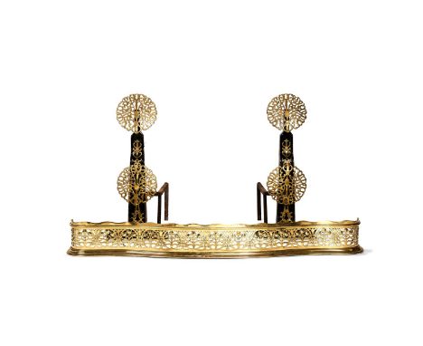 A pair of cast iron and brass mounted andirons, after 17th century examples, late 19th/early 20th century, the recessed and b
